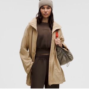 Lululemon Hooded Mid Length Utility Jacket Trench Water Repellent
Size M